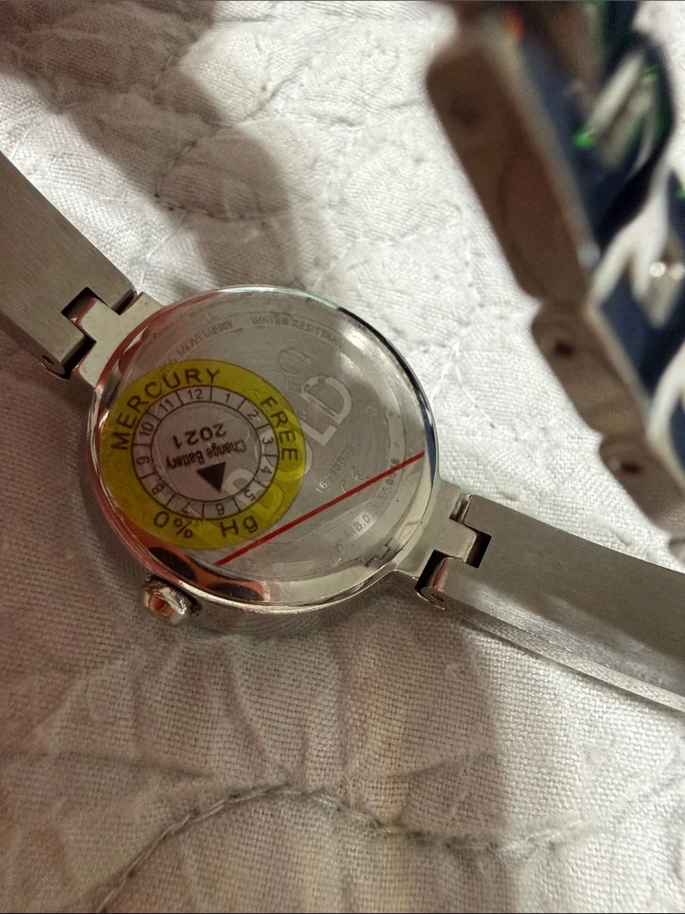 Movado Silver Bracelet Watch with Iridescent Mother-of-Pearl Dial